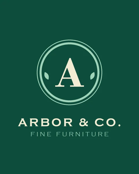Fictional green A logo: a cream serif letter A in a double ring on emerald green for a furniture brand