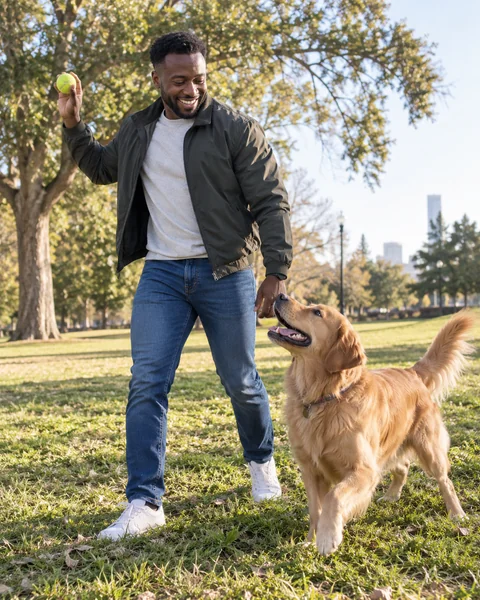 AI dating app photo of a man playing with his dog in a park