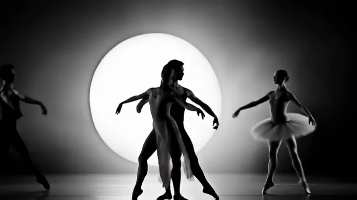 Frame from a later extension of the same clip: several ballet dancers on a stage in front of the moon, same black-and-white style