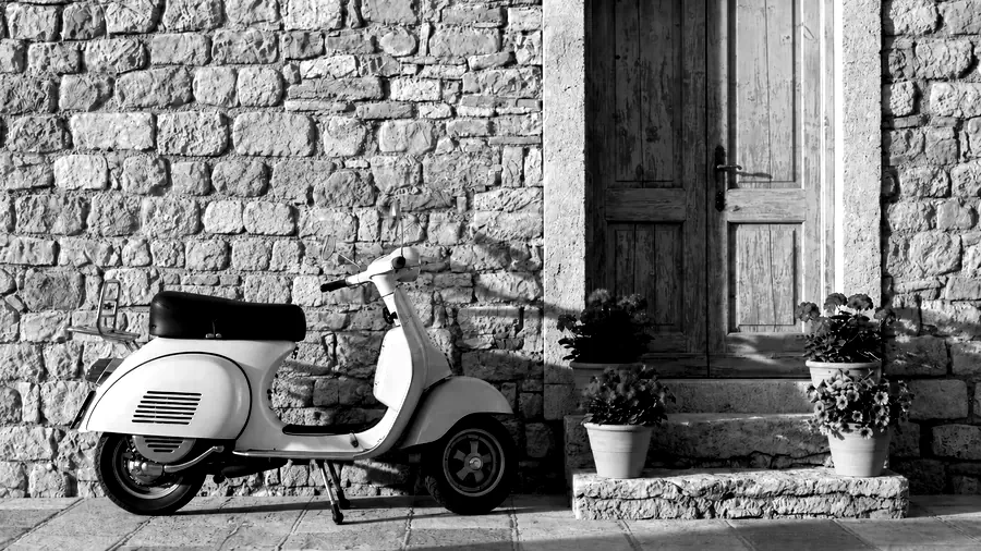 Drag to compare the street photo before and after the High Contrast style (after)