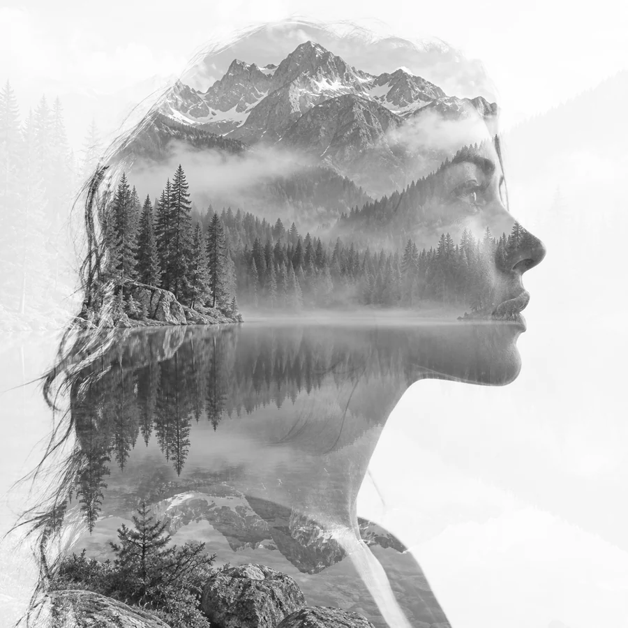 Black and white double exposure of a portrait and a riverside town made with Screen blending