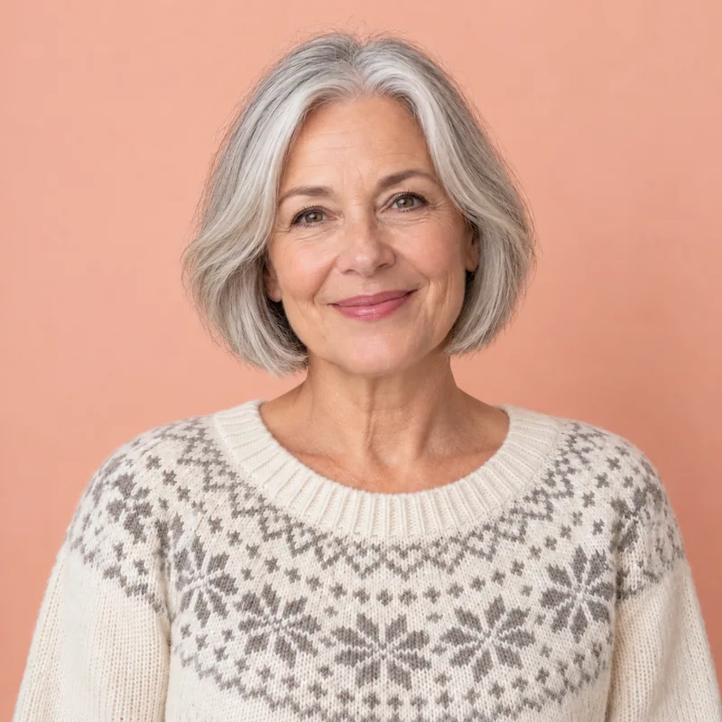 Drag to compare short silver hair with the same woman wearing a polished silver bob (after)