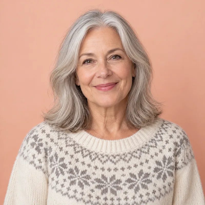 Drag to compare short silver hair with the same woman wearing a polished silver bob (before)