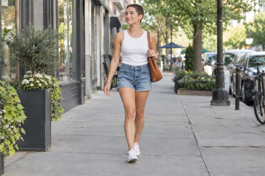 Drag to compare the street photo before and after the buzz cut filter (after)