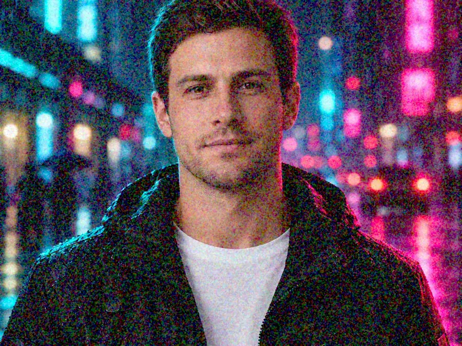 Drag to compare the grainy night street portrait in the rain and the denoised photo (before)
