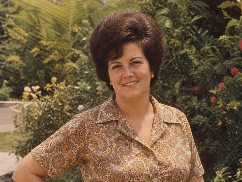 Drag to compare the vintage portrait print before and after AI descreening (after)
