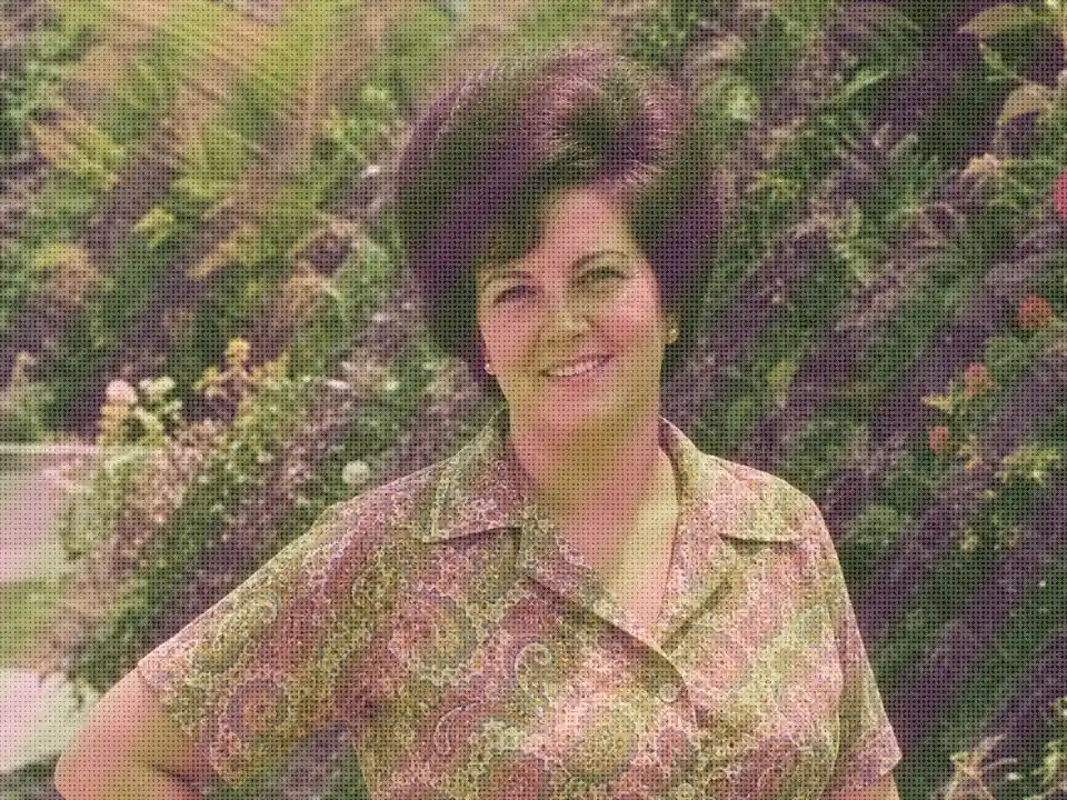 Drag to compare the vintage portrait print before and after AI descreening (before)