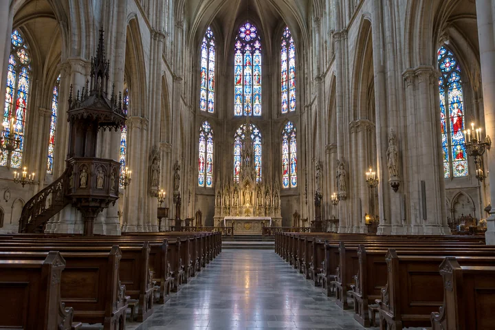 Drag to compare the dark cathedral interior and the HDR version with recovered shadows (after)