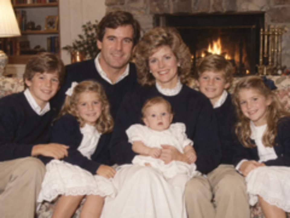 Drag to compare the small family photo and the upscaled print-ready version (before)