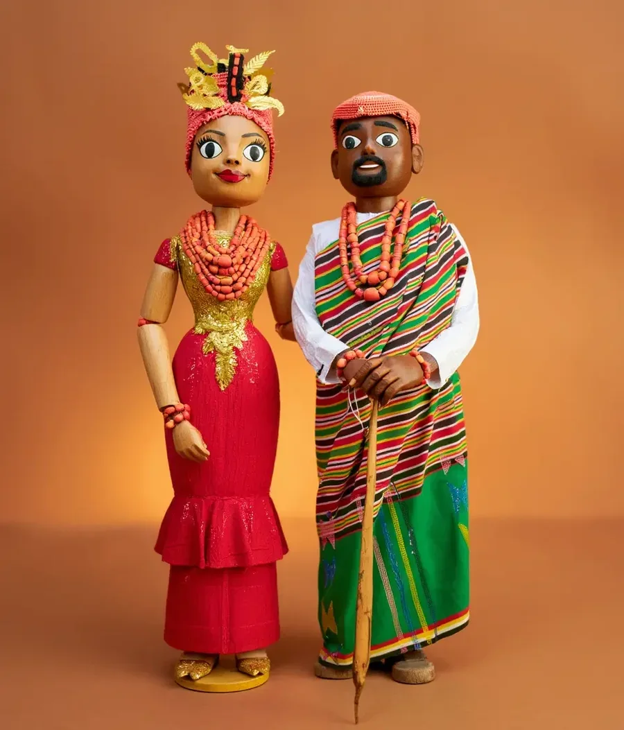 Drag to compare the couple photo and the wooden doll version (after)