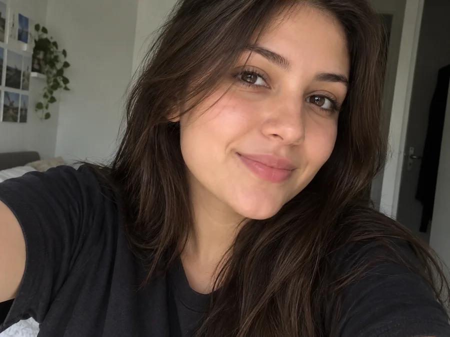 Drag to compare the selfie covered by an emoji and the reconstructed face (after)