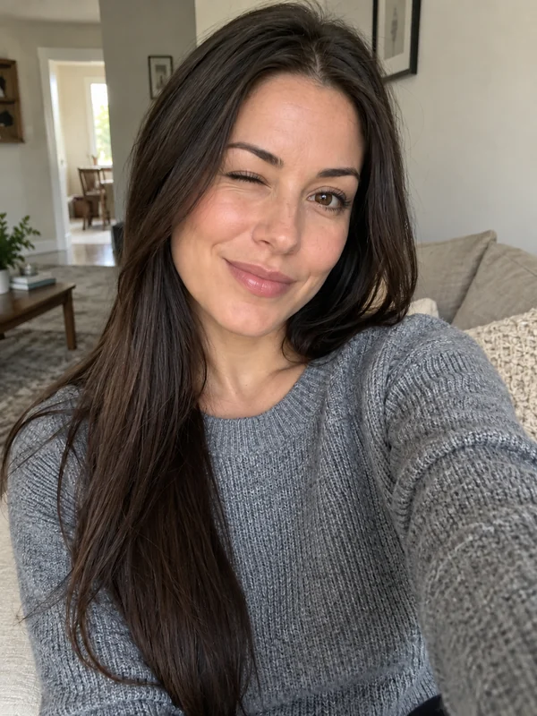 Drag to compare the selfie with both eyes open and the natural wink (after)